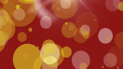 Animation-of-glowing-yellow-spots-on-red-background