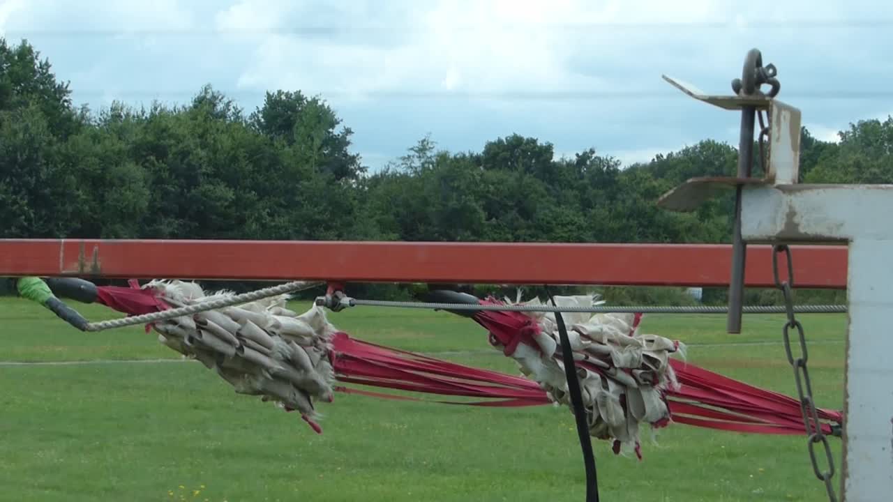 flat screens are pulled over an airfield