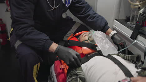 patient, medic and man with oxygen mask