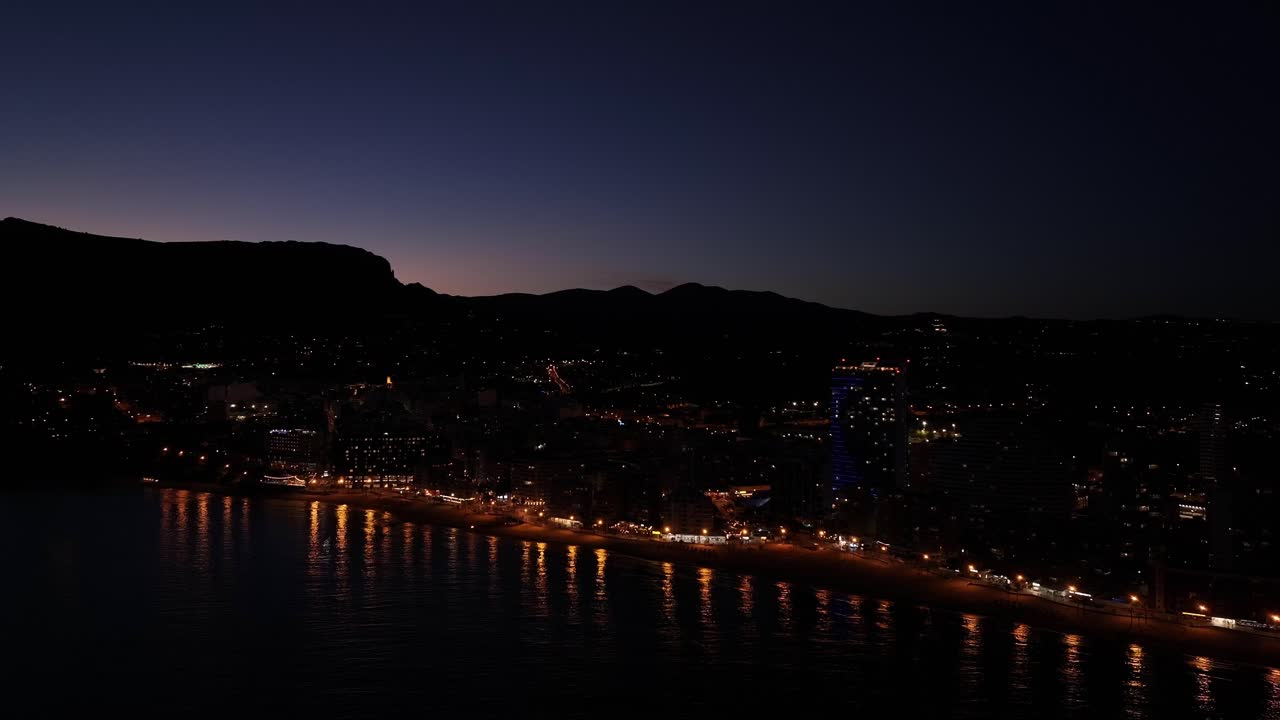 Calpe Coastal Town After Dark: Lights and Mountains Backdrop