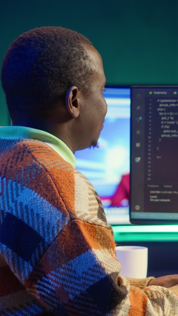 Vertical Video African american IT professional managing AI system for machine learning