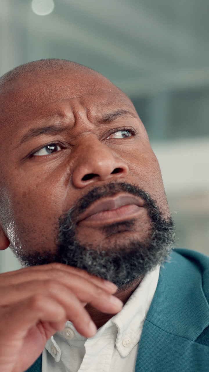 Close-up of Thoughtful African American Businessman Pondering