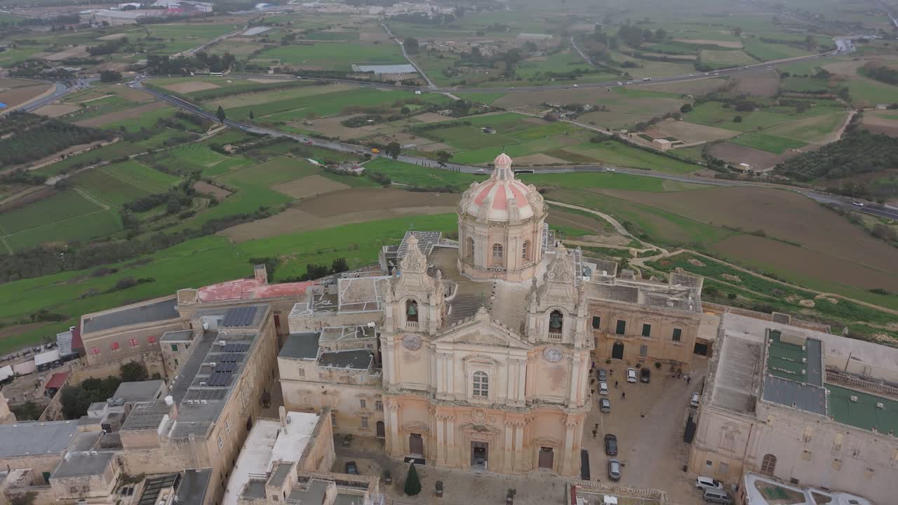 Old Castle Landscape of Mdina Malta Aerial fly touristic landmark, rural fields background