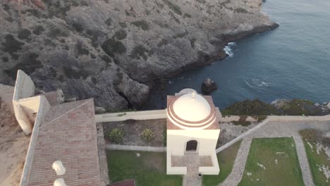 Aerial-view-of-the-Fortress-of-Beliche,-Sagres,-Algarve,-against-cliffs-and-ocean