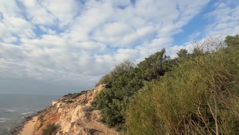 Aerial-view-of-rocky-promontory-facing-the-sea