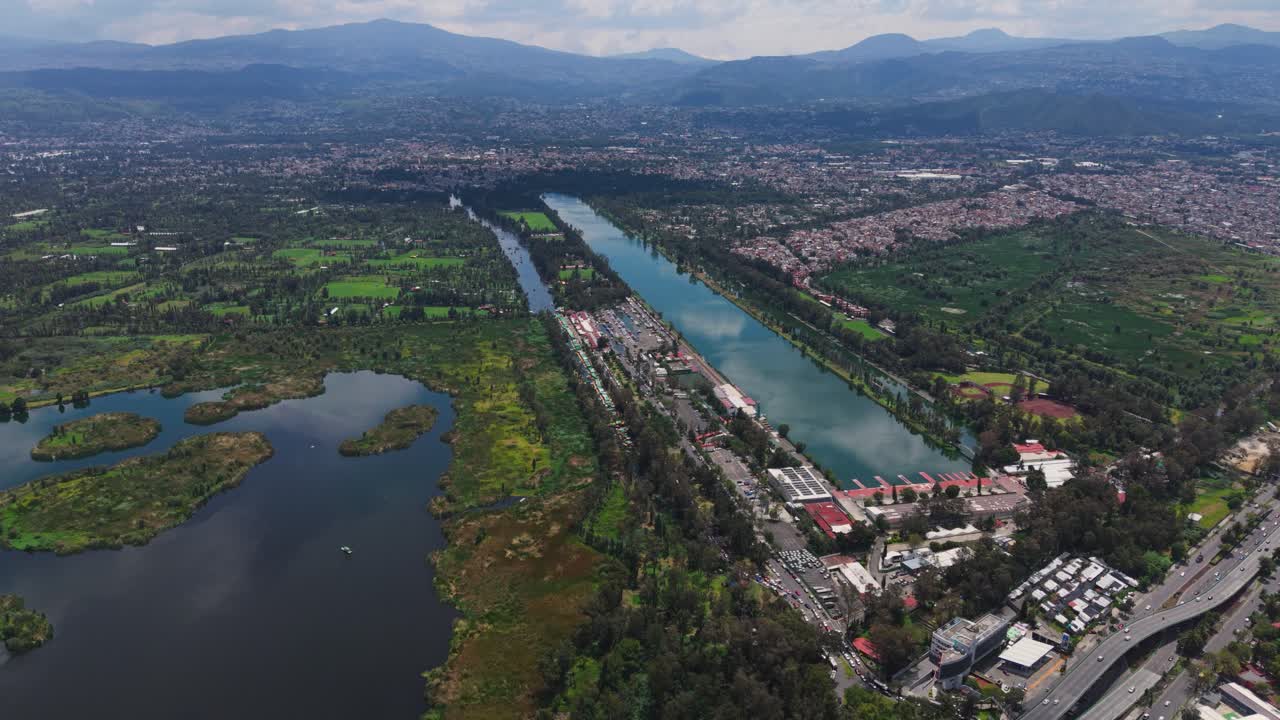 Drone footage of Cuemanco Xochimilco canal in Mexico City on a sunny day