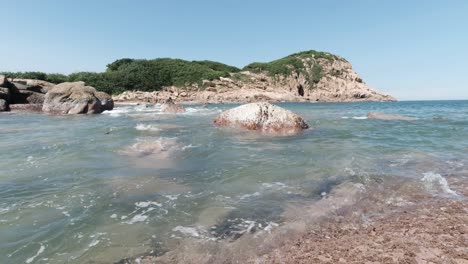 waves hitting rocks at hong kong unesco global geopark in shek o, 4k footage