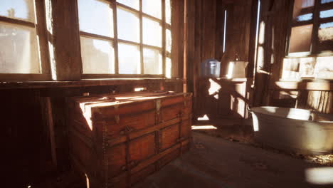 rustic cabin interior with wooden chest and vintage bathtub