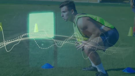 animación de cuadrados y gráficos sobre un jugador de fútbol caucásico haciendo ejercicios de salto en el suelo.