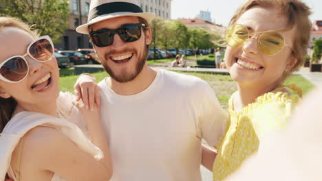 friends taking a selfie outdoors