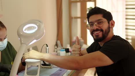 latin-mexican-handsome-beard-close-up-of-man-male-handsome-customer-client-patient-at-nails-spa-wellness-center-luxury-resort-satisfaction-happiness