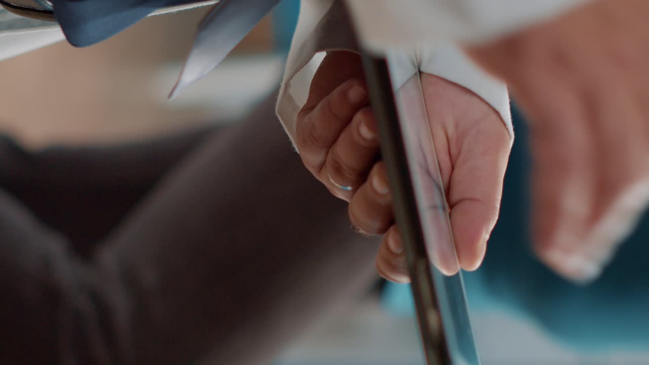 Male doctor using digital tablet at checkup appointment