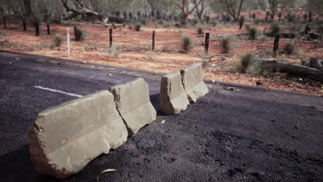 old rusted concrete road barrier blocks