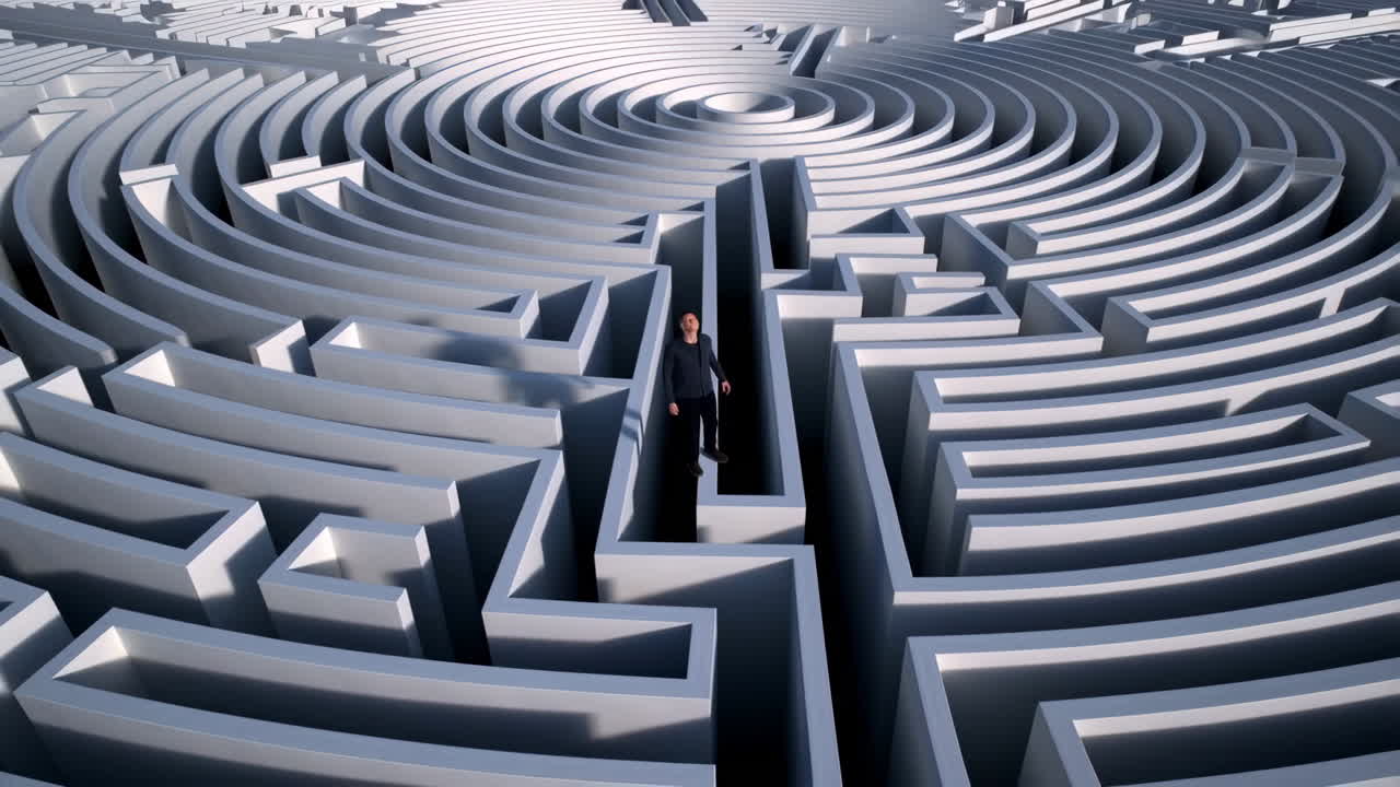 A person standing in the center of a vast, complex circular maze