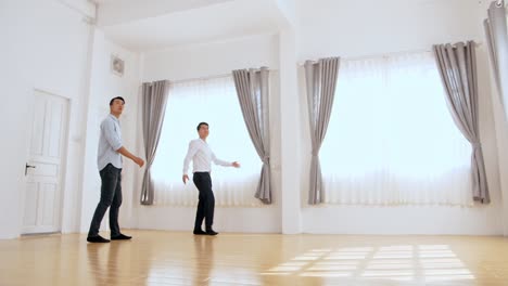 real estate agent shows house to young couple who are in the market for purchasing