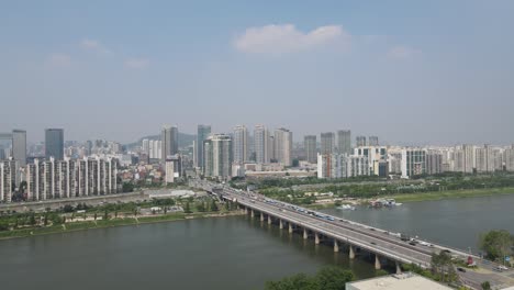 Aerial-view-over-the-beautiful-city-of-Seoul-and-the-Han-River-in-South-Korea