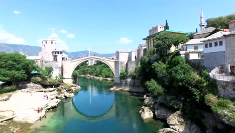 flying away from bridge in mostar, bosnia and herzegovina