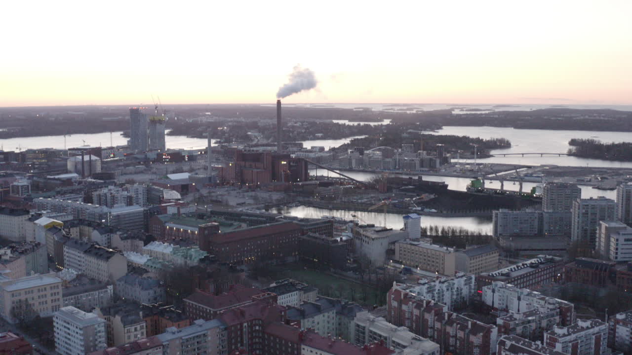 Smoke exhaust from factory near the city center