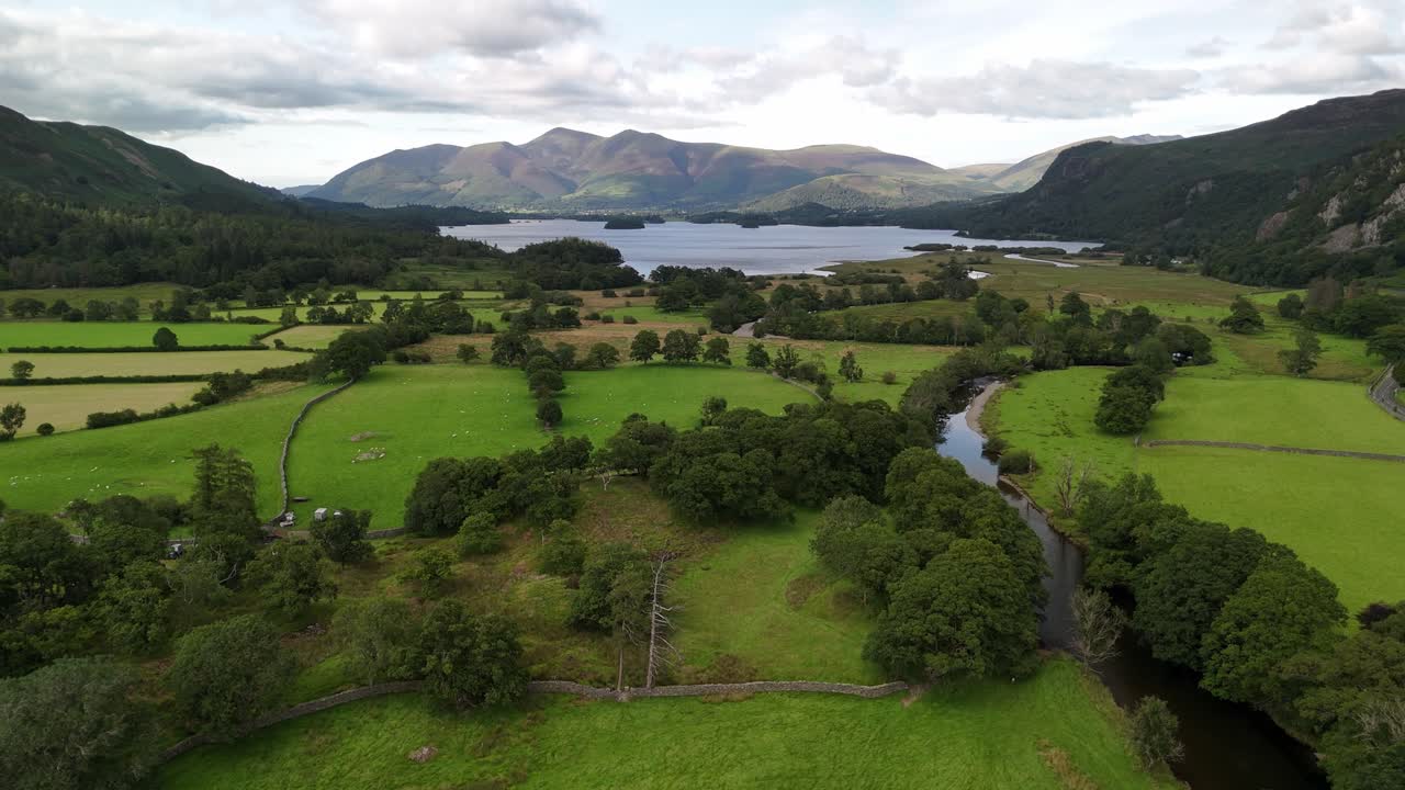 drone view of Derwent Water in Borrowdale with river and lake