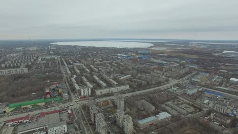 aerial view of a city with a lake