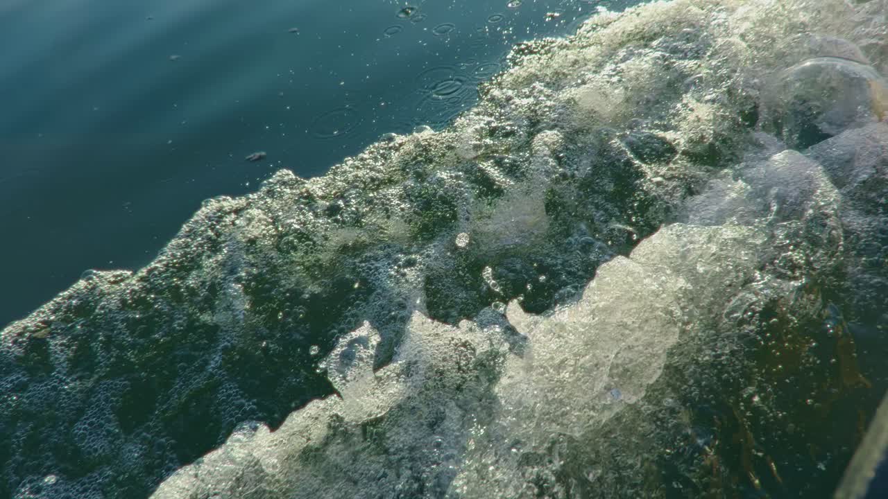 Splashes and ripples on Skadar Lake during a peaceful sunset in Montenegro