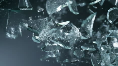 shattered glass fragments in mid-air