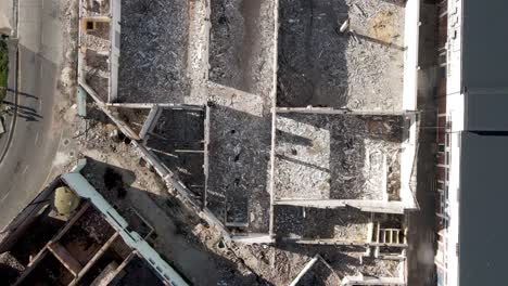 aerial view of old abandoned empty building with debris hout bay harbor south africa