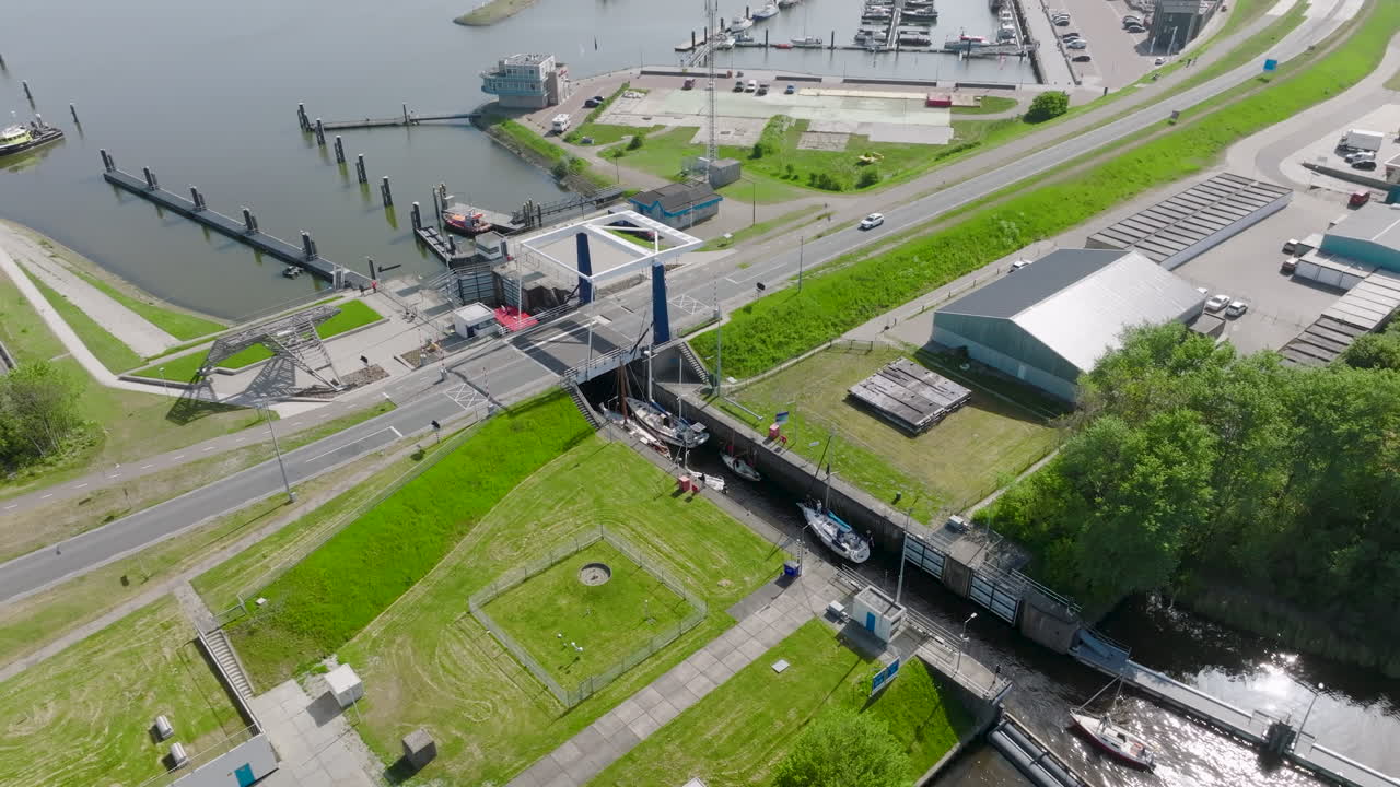 Aerial view of the harbor opens into the vast North Sea, highlighting the natural beauty and maritime significance of this Dutch coastal region