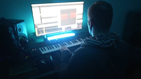 sound producer working in recording studio.