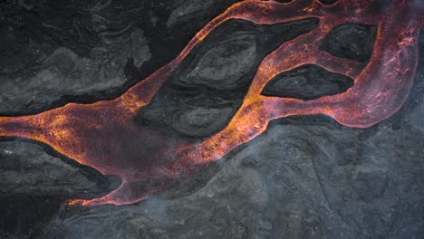 top down rising drone shot from cumbre vieja's lava streams in la palma