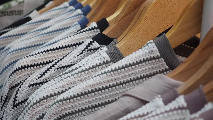 Clothes on Hangers in a Store