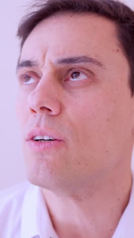 Businessman rehearsing speech, showing nervousness and anxiety