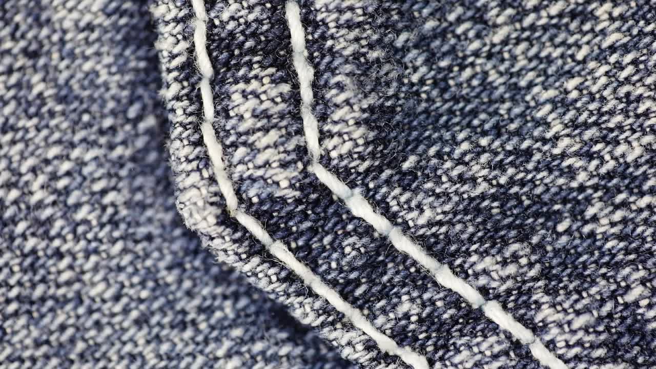 fondo de mezclilla azul oscuro - textura de jeans - primer plano