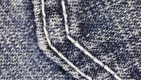 dark blue denim background - jeans texture - close up