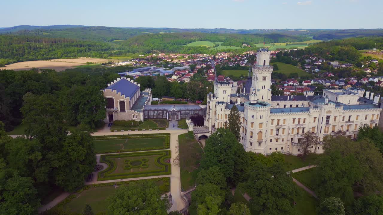 Beautiful aerial top view flight Hlubok&aacute; Nad Vltavou is a Fairy tale castle in Czech Republic Europe, summer day 2023
