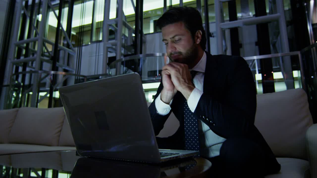 Middle Eastern businessman working with laptop computer device