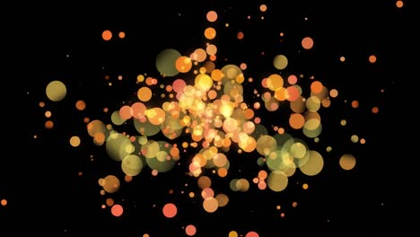 Animation-of-orange-and-yellow-light-spots-moving-on-black-background