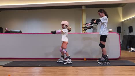 children learning to roller skate