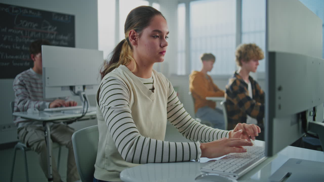 Female Student in University Computer Lab Studies Game Development ...