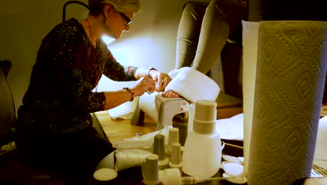 A-young-woman-getting-a-pedicure-at-a-nail-salon