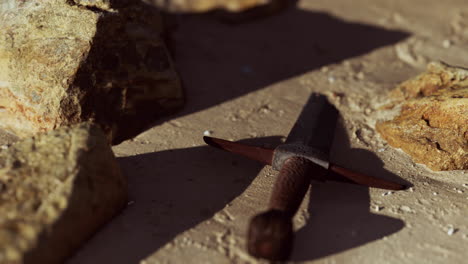 retro sword on sand beach