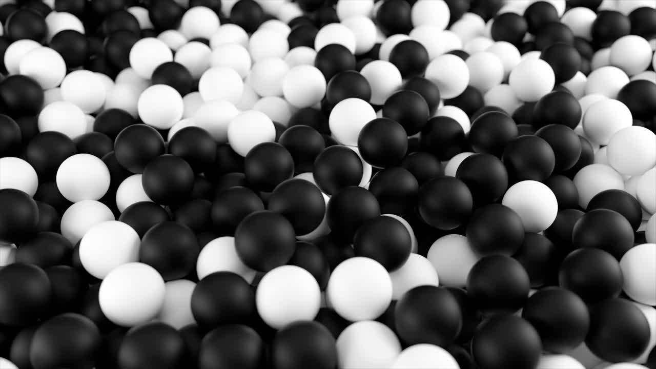 Black white background animation from a pile of abstract spheres
