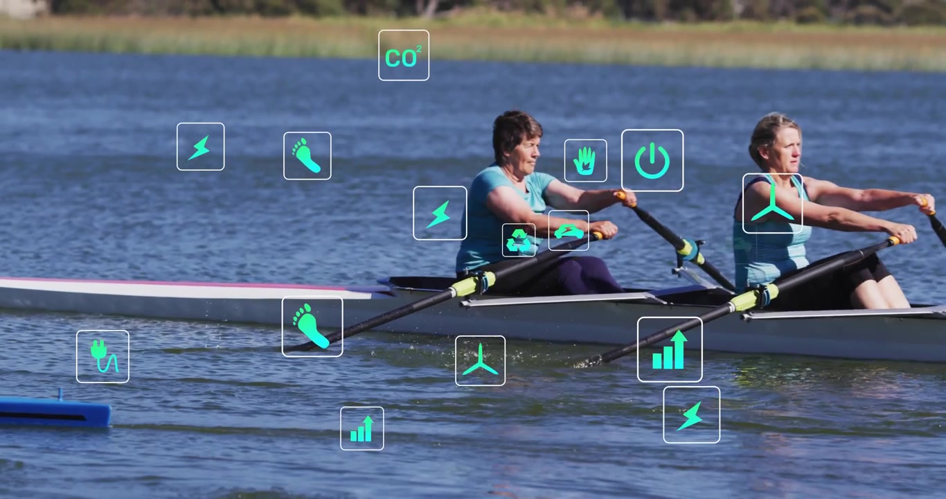 Senior rower rowing on lake showing sports metrics as camera pans revealing women matching strokes
