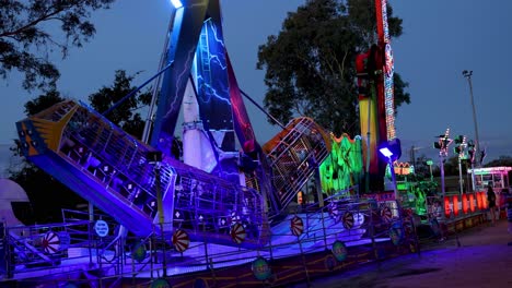 night amusement park rides with people