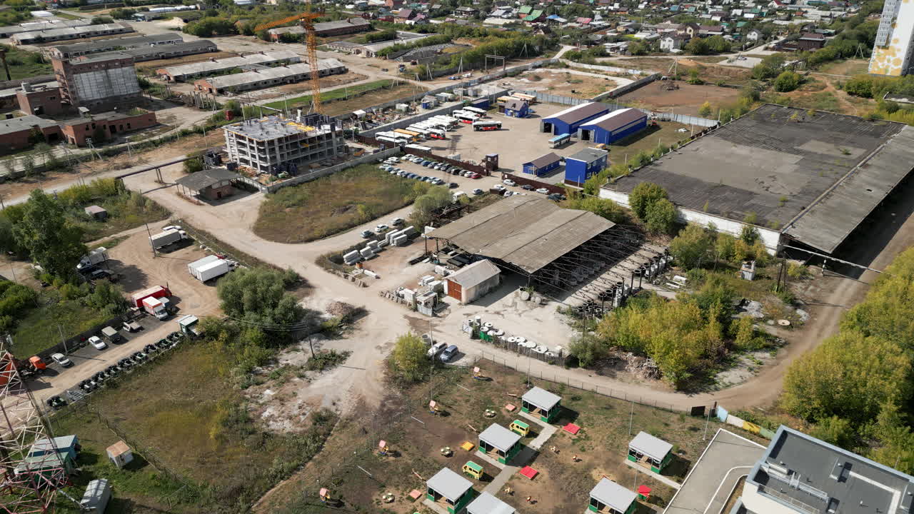Aerial View of an Industrial and Commercial Area with Construction and Warehouses