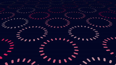 circular arrangement of overlapping red circles on a black background