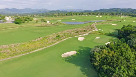 Green-Landscape-And-Bunkers-At-Vistas-Golf-Course-In-Santo-Domingo,-Dominican-Republic