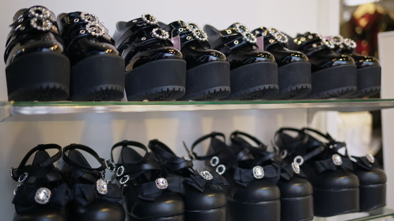 Multiple platform shoes on display in a store on the Takeshita shopping street in Tokyo, Japan