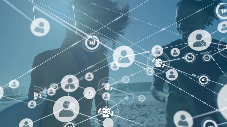 Animazione di rete di connessioni con icone multimediali su coppia afroamericana felice