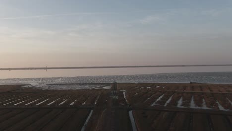 Beautiful-Afternoon-Sky-Over-Tidal-Flat-Of-North-Sea-Near-Husum-In-Germany